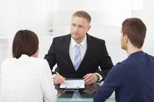 couple consulting with attorney