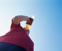 overweight man drinking soda