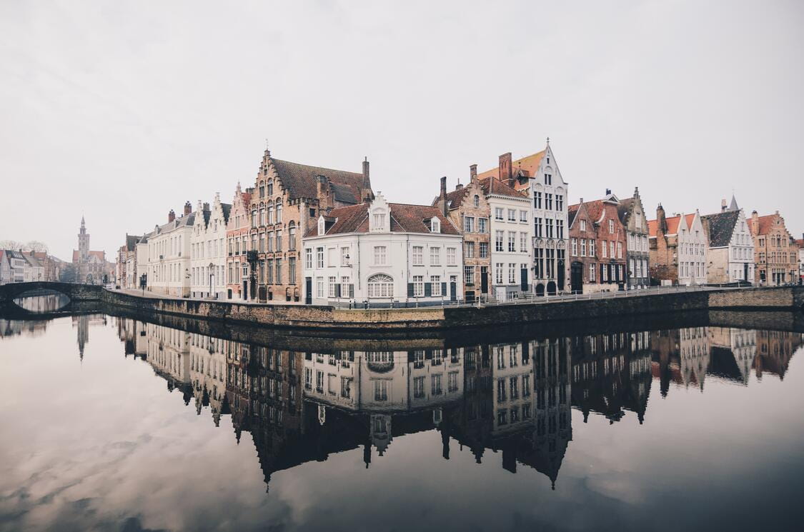 Belgium buildings reflecting in water