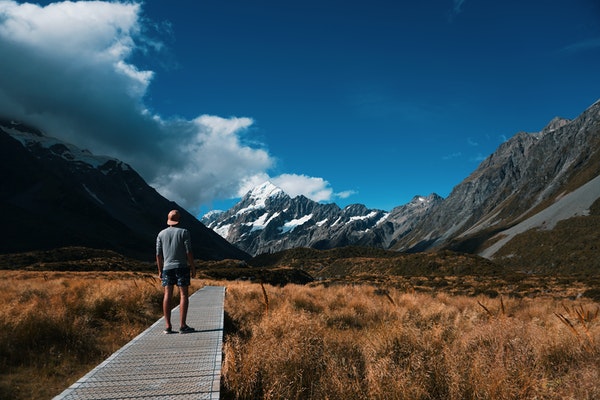person looking at mount cook in new zealand