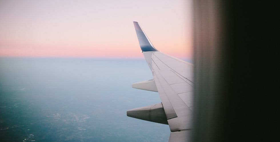 view-of-airplane-wing-on-flight
