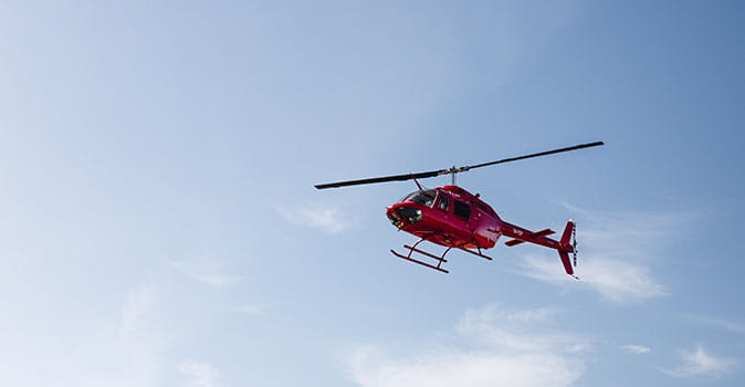 emergency medical evacuation helicopter flying in the sky