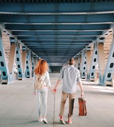 couple walking into airport