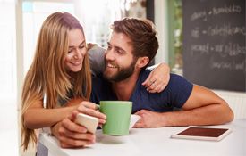 couple drinking coffee in coffee house