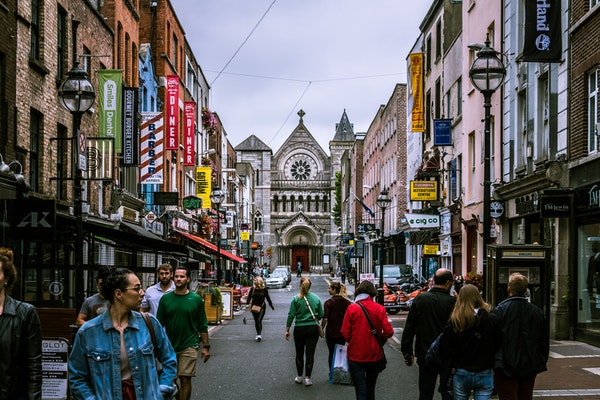 city street with pedestrians in dublin ireland