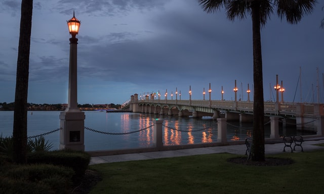 lit bridge over water in the evening in st augustine florida