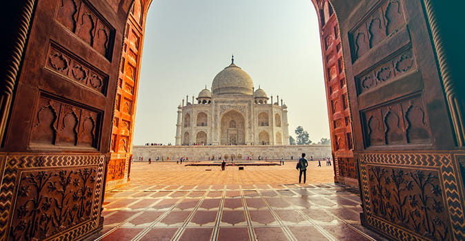 study in India image, student standing outside Taj Mahal