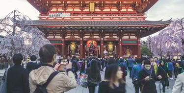 tourist-taking-photo-of-temple-in-japan