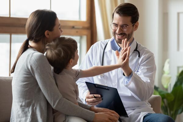 happy-male-doctor-have-fun-cheer-support-small-7s-boy