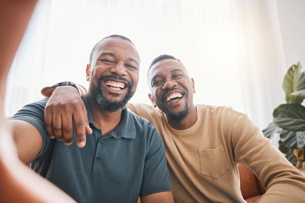 happy-black-man--friends-and-selfie-in-photography--bonding-or