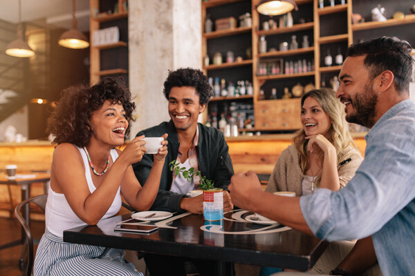 young-friends-having-a-great-time-in-restaurant