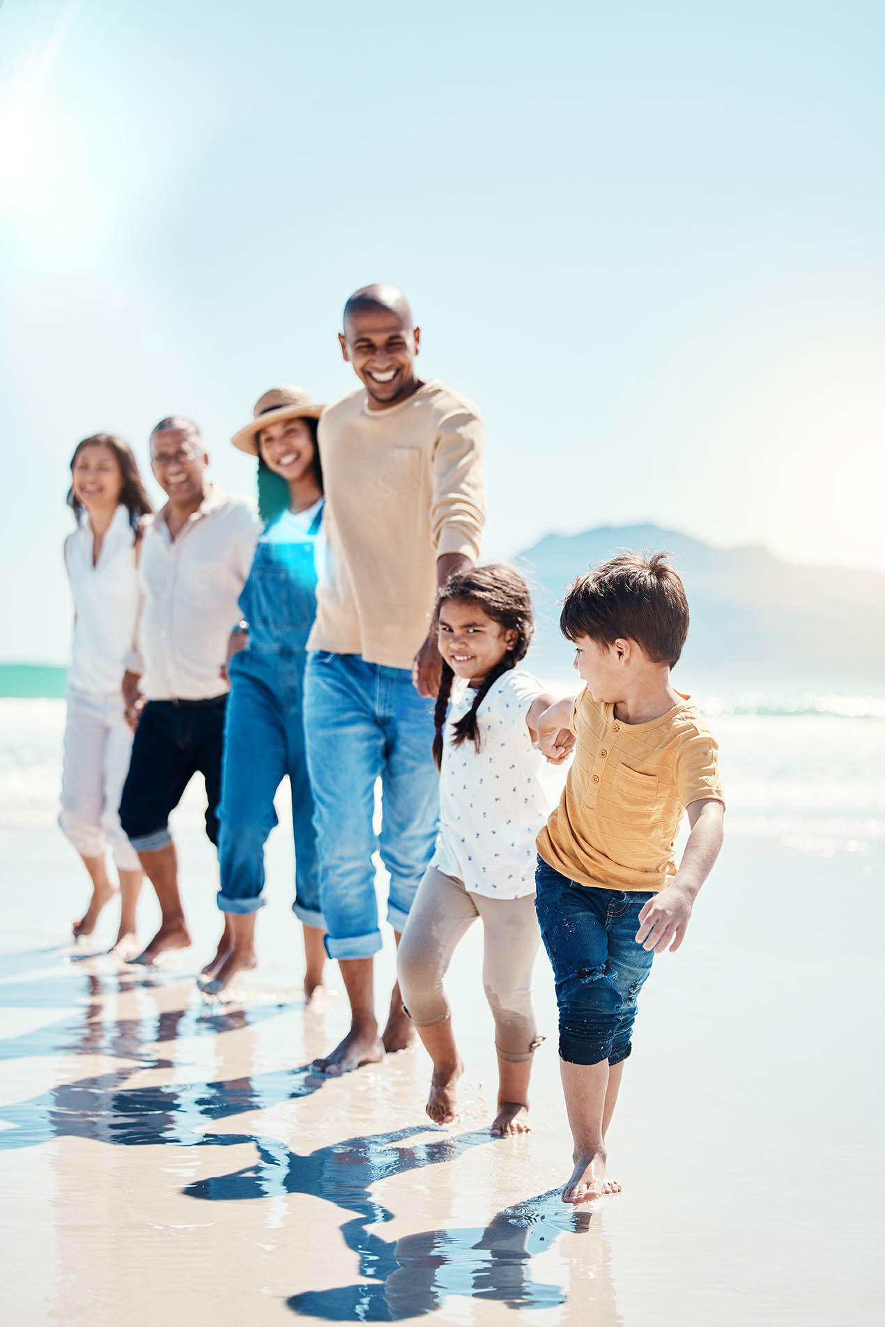 family-enjoying-the-beach-together family-enjoying-the-beach-together