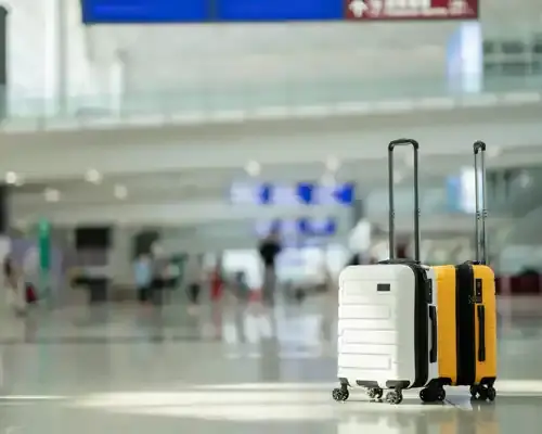 two-suitcases-in-an-empty-airport-hall--traveler-cases-in