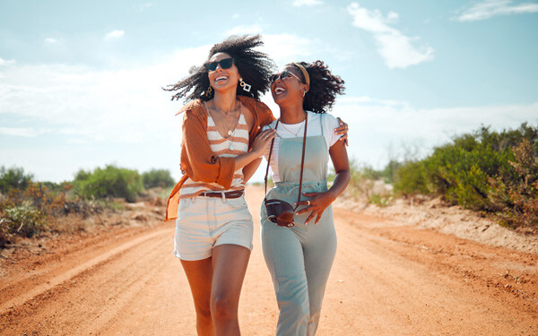 walking--happy-and-friends-on-holiday-at-a-safari-during