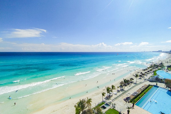white beaches along the water in cancun mexico